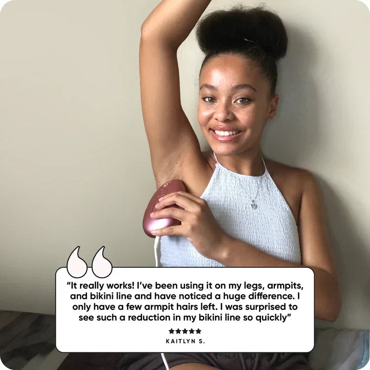 Smiling woman using LaxeHaven hair removal device on her armpit, holding a customer review.